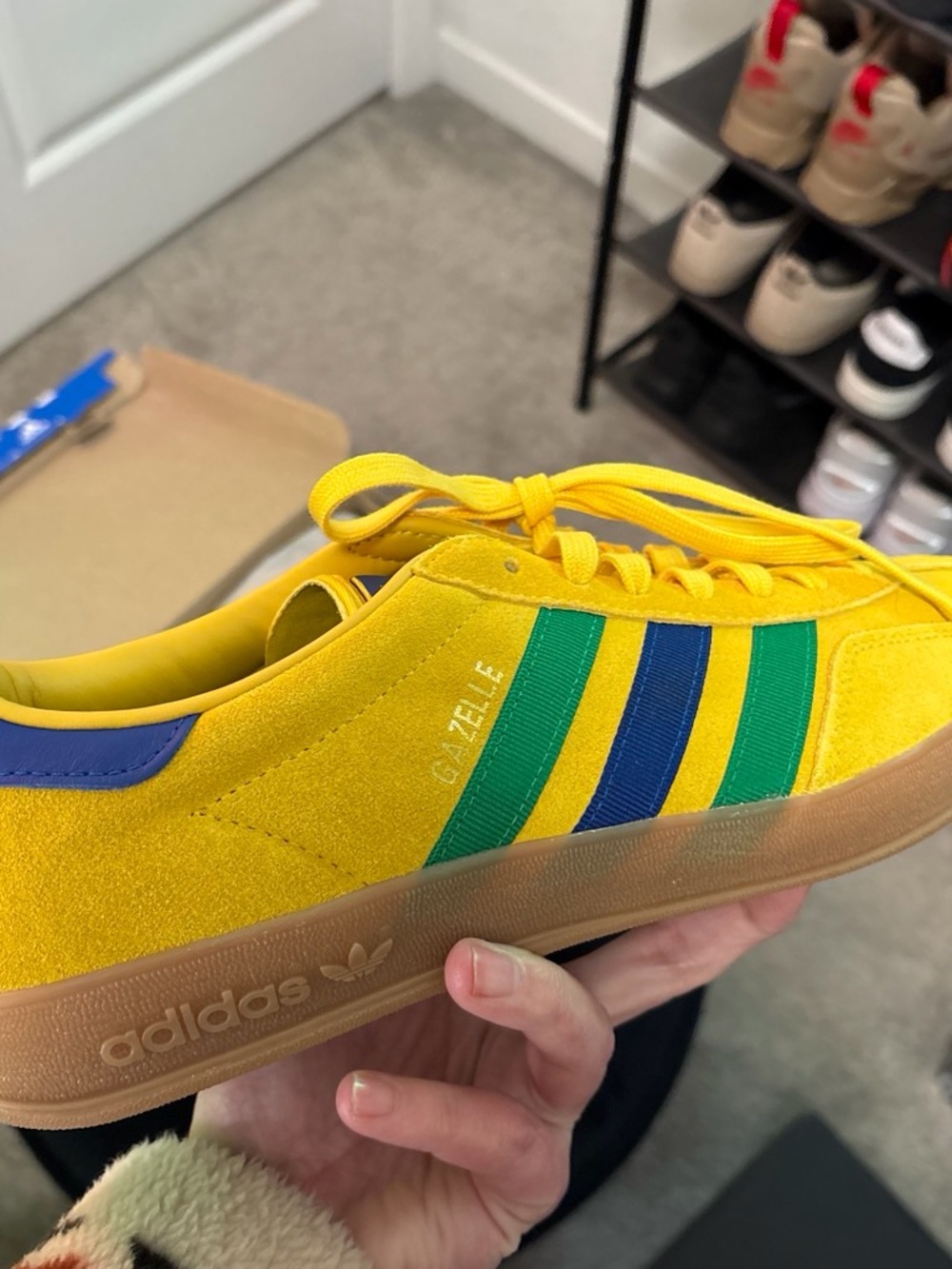 adidas men’s World Cup lim ED Gazelle Sneaker in Yellow W/ Blue & Green Stripes